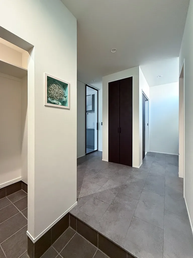 買い物袋を置いて